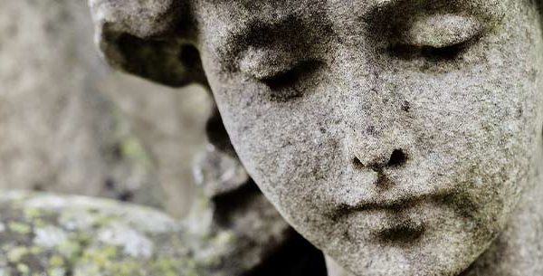 Stone angel statue weeping