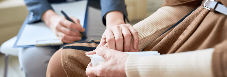 Person helping someone prepare for funeral