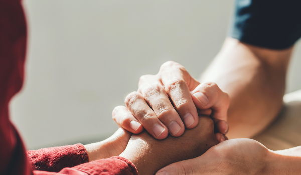 two hands holding